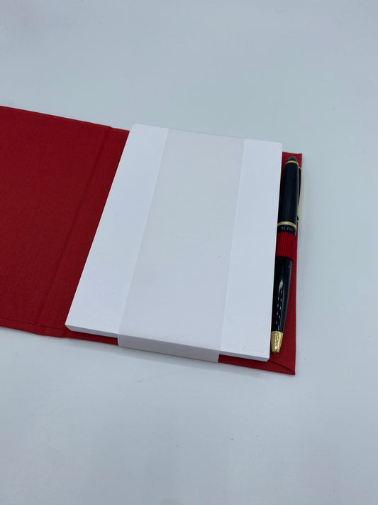 Notizblock mit Kugelschreiber